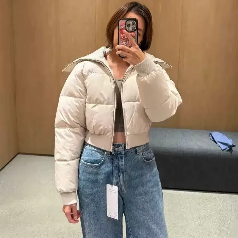 Veste courte matelassée à col tricoté